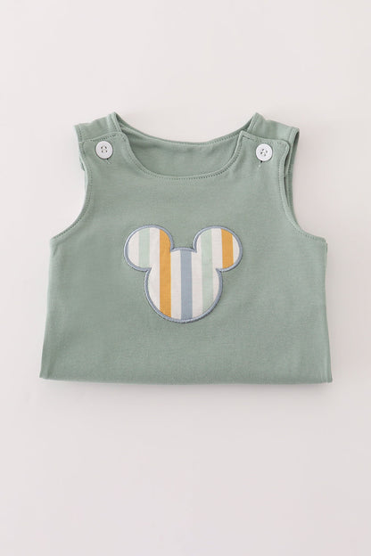 Green character applique bubble